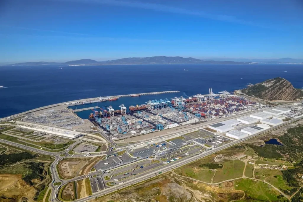 Aerial view of a major Moroccan port on the Mediterranean coast, symbolizing global openness and economic connectivity.